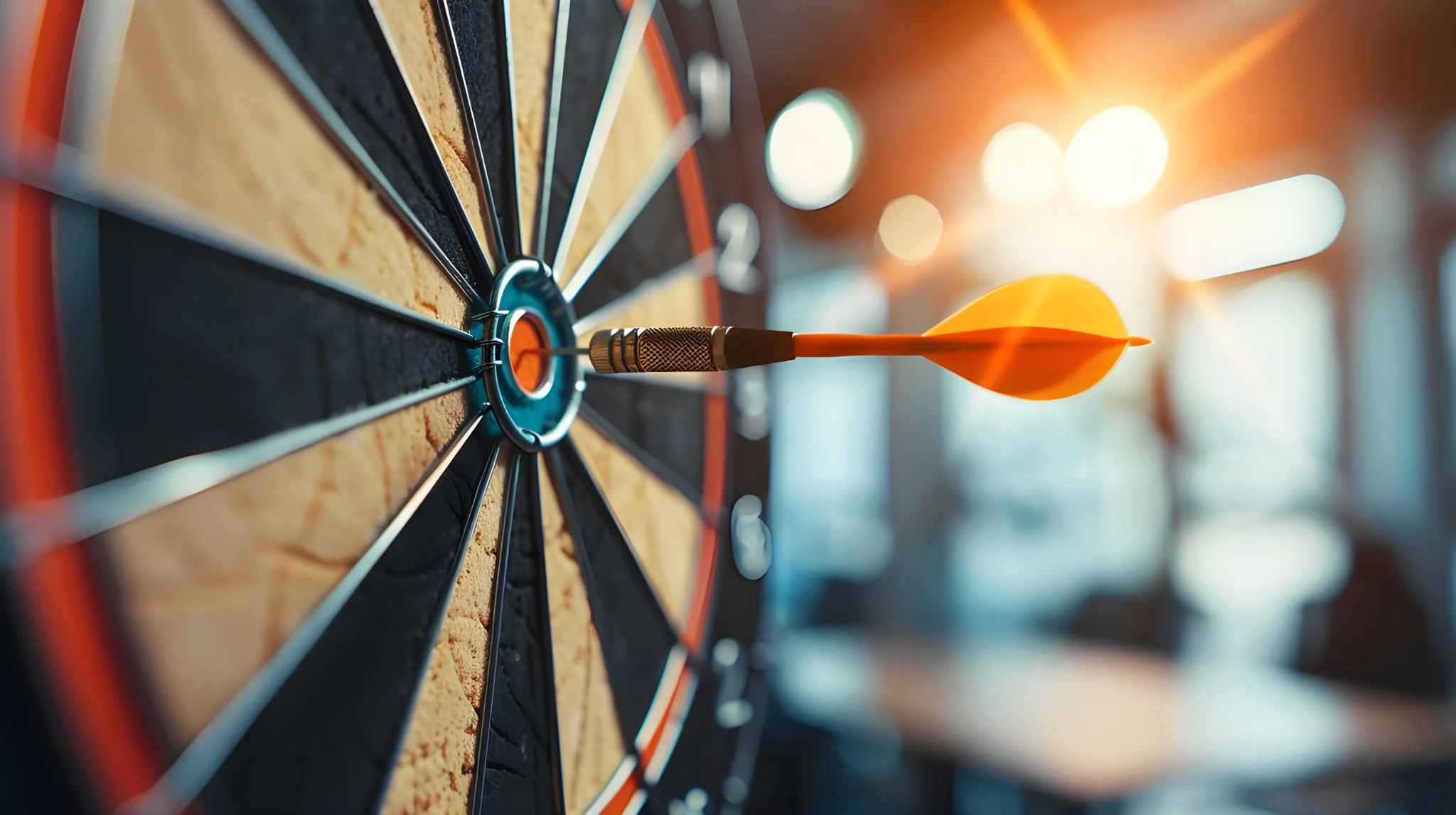 An orange dart in the bullseye of a textured dartboard